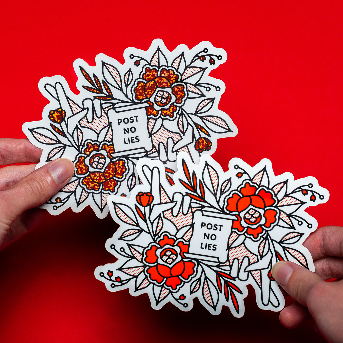 Two hands hold floral die-cut stickers with "POST NO LIES" text, printed on vinyl and glitter materials on a vibrant red background.