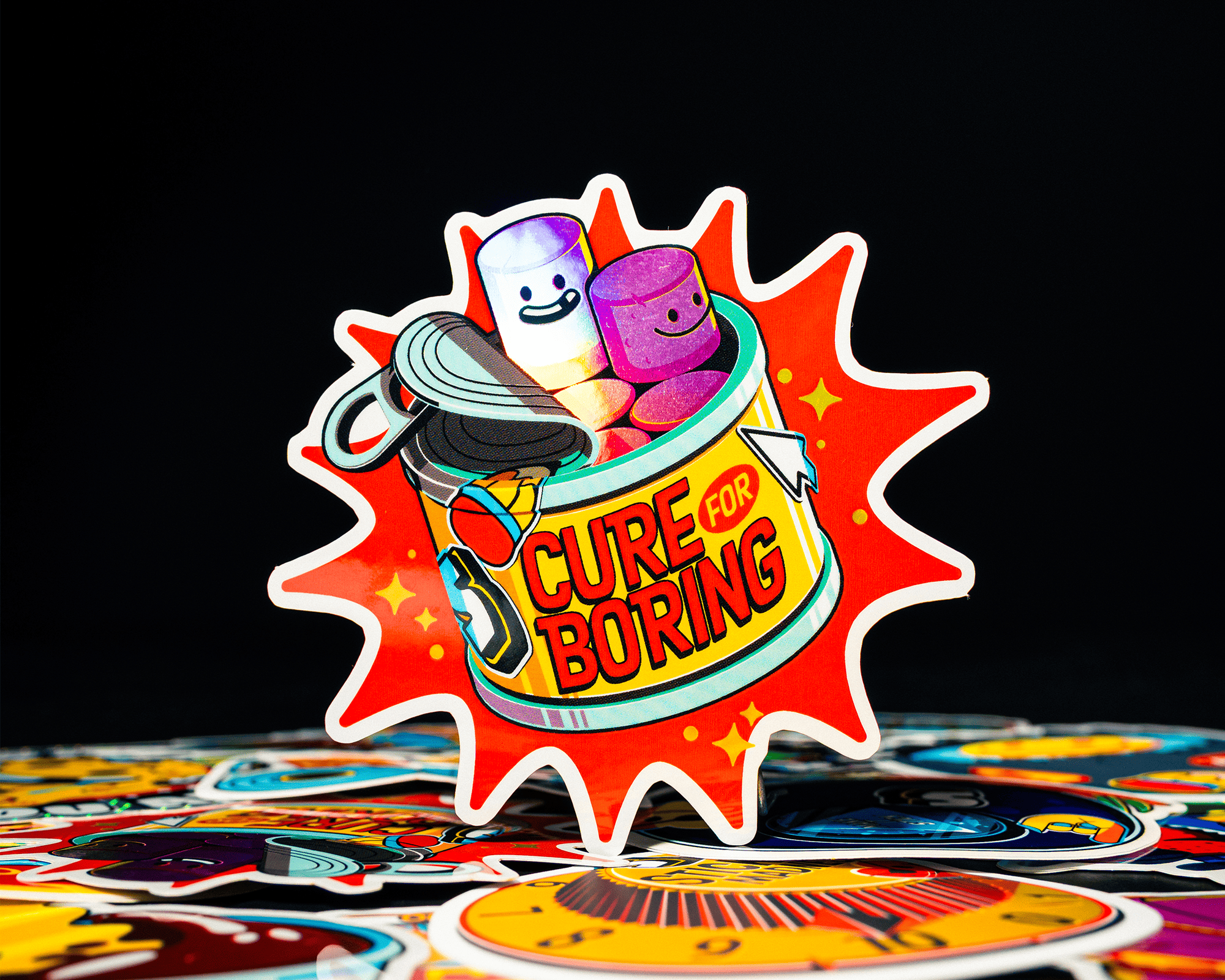 A colorful sticker that is a can with the text "Cute and boring"