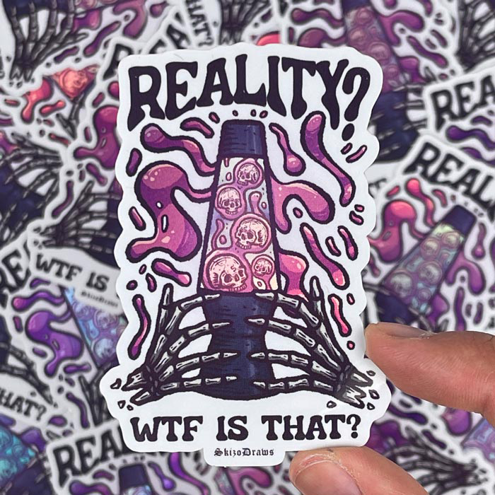 Pegatina troquelada de vinilo de unas manos de esqueleto sosteniendo una lámpara de lava, con calaveras flotando y el texto «REALITY? WFT IS THAT?», sobre un fondo de pegatinas.